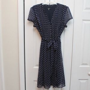 Navy polka dot tie-waist dress